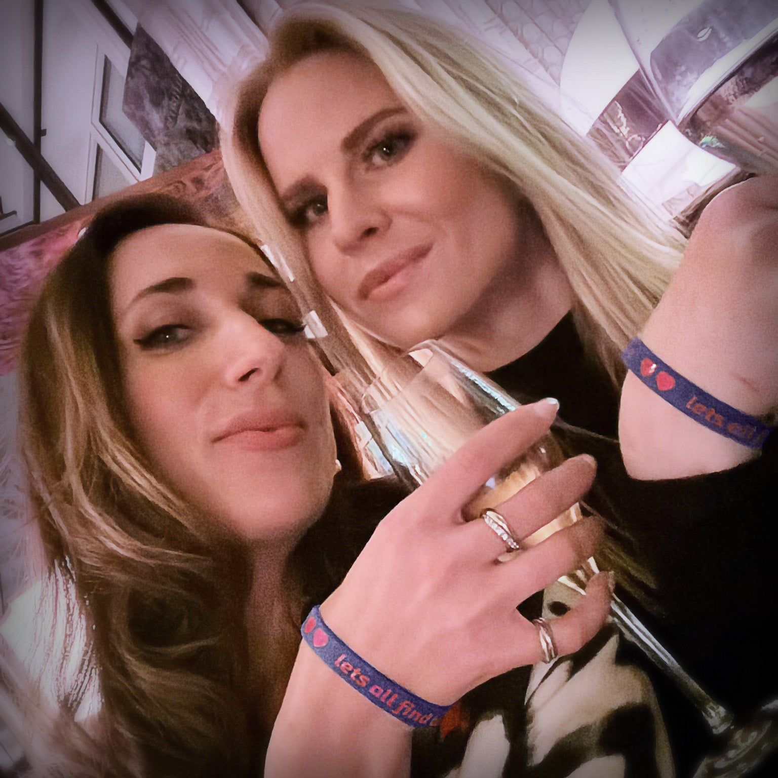 Single girls out and about wearing the lets all love wristband hoping to make some connections